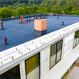 Flat roof installation by DuraMax Roofing & Exteriors