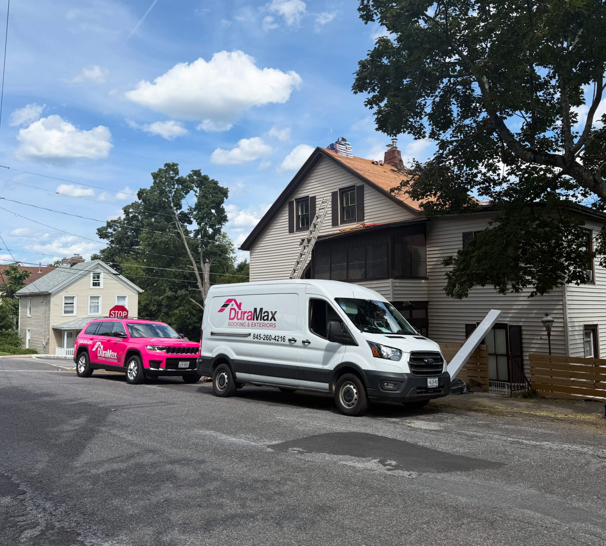 DuraMax Roofing crew working on a roof