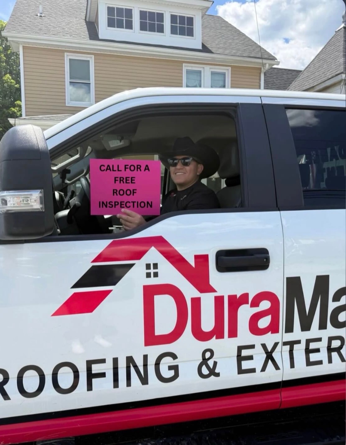DuraMax Roofing team and work van