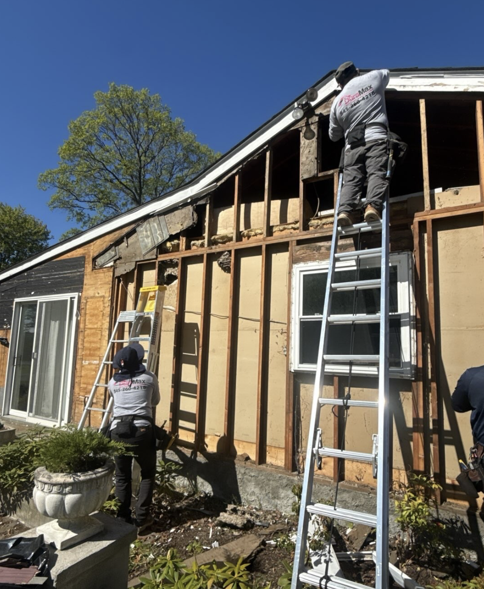 Bare exterior sheathing exposed and ready for new siding installation
